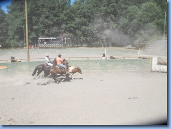 3 riders at high speed practicing rodeo moves on a rodeo clinic with Antilco